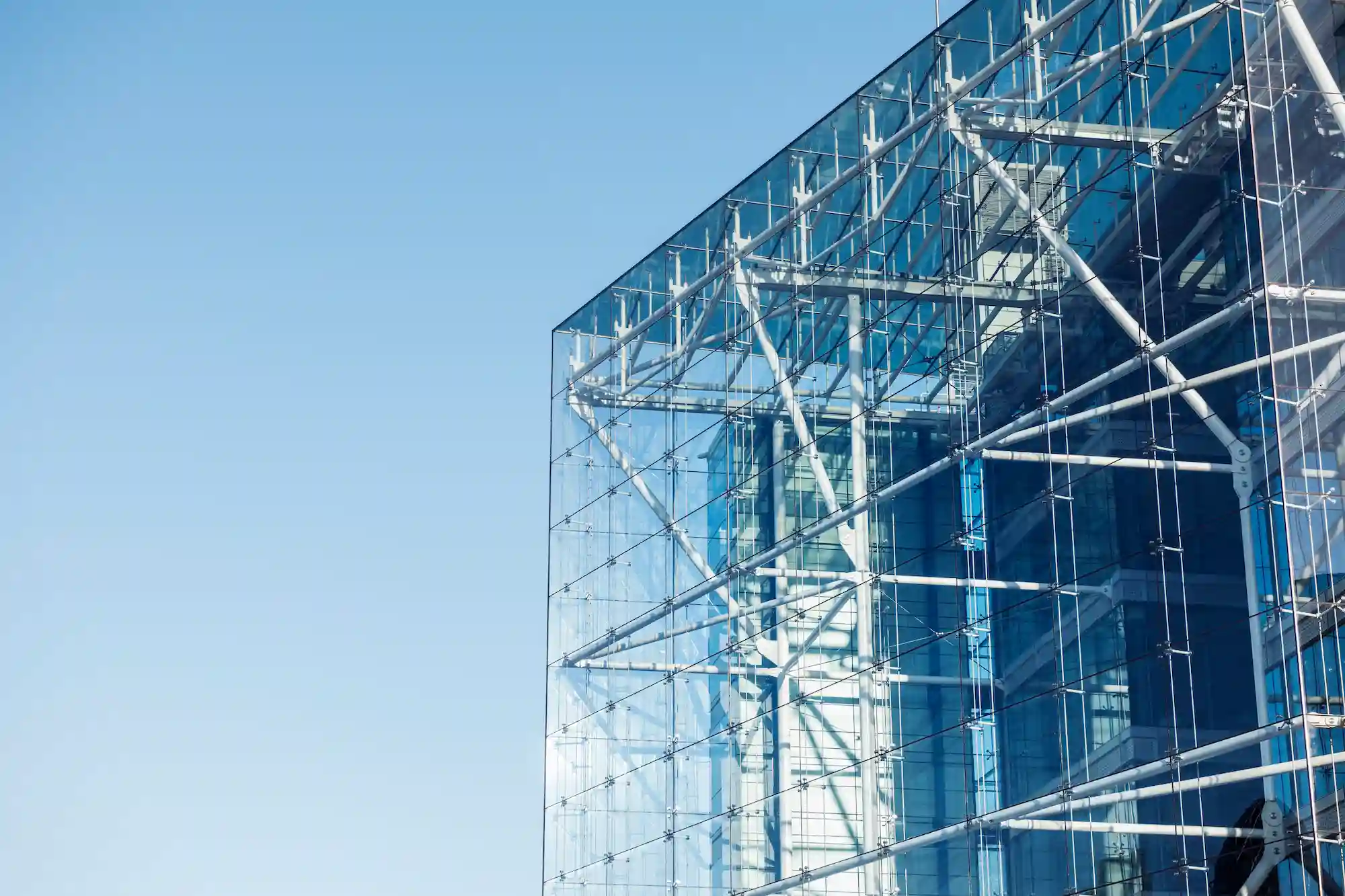 Modern glass building exterior supported by professional scaffolding from San Diego Elite Scaffolding